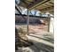 Backyard area with a covered patio and brick pathway at 4795 Via San Andros, Las Vegas, NV 89103