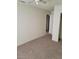 Bedroom featuring neutral walls, carpet flooring and a ceiling fan at 4795 Via San Andros, Las Vegas, NV 89103