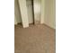 Bedroom featuring neutral walls, carpet flooring and a mirrored closet at 4795 Via San Andros, Las Vegas, NV 89103
