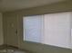 Functional entryway with a door, blinds on the window, and neutral wall paint at 4795 Via San Andros, Las Vegas, NV 89103