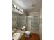 Cozy bathroom with tiled walls, a shower-tub combo, and a granite-topped vanity with ample counter space at 4928 E Monroe Ave, Las Vegas, NV 89110