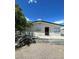 Charming single-story home featuring a well-maintained front yard and classic architectural details at 5128 Forrest Hills Ln, Las Vegas, NV 89108