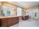 Expansive bathroom offering dual sinks and a makeup vanity area with generous lighting at 52 Cascade Lake St, Las Vegas, NV 89148