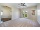 Sun-filled bedroom with balcony access and views of the surrounding landscape at 52 Cascade Lake St, Las Vegas, NV 89148