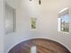 Bedroom featuring hardwood floors and picturesque windows with custom blinds at 52 Cascade Lake St, Las Vegas, NV 89148