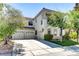 Beautiful two-story stucco home with a three-car garage and well-maintained landscaping at 52 Cascade Lake St, Las Vegas, NV 89148