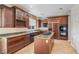 Gourmet kitchen featuring granite countertops, custom cabinetry, and modern appliances at 52 Cascade Lake St, Las Vegas, NV 89148