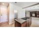 Kitchen island cooktop with granite counters near the Gathering room and pantry at 52 Cascade Lake St, Las Vegas, NV 89148