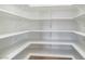 Walk-in pantry offering ample storage with built in shelving and custom paint at 52 Cascade Lake St, Las Vegas, NV 89148