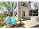Backyard featuring a lap pool with a water feature, perfect for relaxation and entertaining at 52 Cascade Lake St, Las Vegas, NV 89148