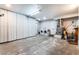 Large basement with ample storage cabinets and laundry area at 5221 Holmby Ave, Las Vegas, NV 89146