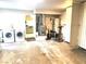 Spacious basement area with laundry machines and additional equipment at 5221 Holmby Ave, Las Vegas, NV 89146