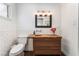 Stylish bathroom featuring a unique wood sink, subway tile, and modern fixtures at 5221 Holmby Ave, Las Vegas, NV 89146