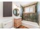 Stylish bathroom with a modern vanity, vessel sink, and tiled shower-tub combination at 5221 Holmby Ave, Las Vegas, NV 89146
