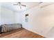 Small bedroom featuring a bed, window, and mini-split AC unit at 5221 Holmby Ave, Las Vegas, NV 89146