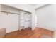 Bedroom with hardwood floors, closet and open shelving at 5221 Holmby Ave, Las Vegas, NV 89146
