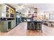 Inviting kitchen with a large center island and a view into the dining area at 5221 Holmby Ave, Las Vegas, NV 89146