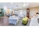 Bright living room with modern flooring, comfortable seating, and a dining area at 5221 Holmby Ave, Las Vegas, NV 89146