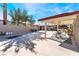 Enjoy outdoor living on this spacious covered patio with stylish furniture and a well-maintained concrete floor at 5221 Holmby Ave, Las Vegas, NV 89146