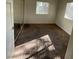 Bedroom with neutral carpet, mirrored closet doors, and natural light from two windows at 5250 S Rainbow Blvd # 1010, Las Vegas, NV 89118