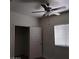 Bedroom featuring neutral carpet and ceiling fan with light fixture at 5250 S Rainbow Blvd # 1010, Las Vegas, NV 89118