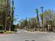 Gated community entrance showcasing lush landscaping and well-maintained grounds at 5250 S Rainbow Blvd # 1010, Las Vegas, NV 89118