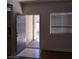 Entryway of a home with an open door, tiled flooring and view of the outside at 5250 S Rainbow Blvd # 1010, Las Vegas, NV 89118