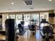 Fitness center with various exercise machines overlooking the pool at 5250 S Rainbow Blvd # 1010, Las Vegas, NV 89118