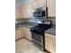 This kitchen offers stainless steel oven/stove, a built in microwave, and granite countertops at 5250 S Rainbow Blvd # 1010, Las Vegas, NV 89118