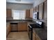 Updated kitchen features granite countertops and stainless steel appliances at 5250 S Rainbow Blvd # 1010, Las Vegas, NV 89118