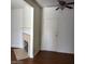 A spacious living room boasts a fireplace and wood floors at 5250 S Rainbow Blvd # 1010, Las Vegas, NV 89118