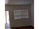 Neutral living room with window blinds and dark floors ready for your personal touches at 5250 S Rainbow Blvd # 1010, Las Vegas, NV 89118