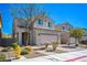 Charming two-story home with desert landscaping, attached two-car garage, and a welcoming front entrance at 5628 Ridgeland St, North Las Vegas, NV 89031