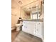 Bathroom featuring white cabinets, a granite countertop, and a toilet at 6250 W Flamingo Rd # 103, Las Vegas, NV 89103