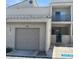 Two-story condo with a one car garage and a small balcony at 6250 W Flamingo Rd # 103, Las Vegas, NV 89103
