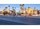 Community featuring palm trees, manicured landscaping, and well-maintained exteriors at 6250 W Flamingo Rd # 103, Las Vegas, NV 89103