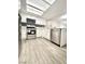 Clean kitchen with stainless steel appliances, white cabinets, and modern lighting at 6250 W Flamingo Rd # 103, Las Vegas, NV 89103