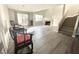 Spacious living room featuring hardwood floors, a fireplace, and a sliding glass door to the outside at 6250 W Flamingo Rd # 103, Las Vegas, NV 89103