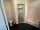 Bathroom featuring a toilet, bathtub, shower, and closet at 6250 W Flamingo Rd # 157, Las Vegas, NV 89103