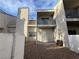 Exterior angle showing balcony access and a low maintenance rock yard with a small outdoor seating area at 6250 W Flamingo Rd # 157, Las Vegas, NV 89103