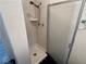 Bathroom shower features tile surround, shower head and shower caddy at 6250 W Flamingo Rd # 157, Las Vegas, NV 89103