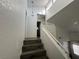 Staircase leading to the upper level of the home at 6250 W Flamingo Rd # 157, Las Vegas, NV 89103