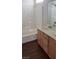 Bathroom with a double sink vanity and bathtub at 6316 Beige Bluff St # 201, North Las Vegas, NV 89081