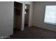 Bedroom showcasing a closet and a bright window at 70 Belle Essence Ave, Las Vegas, NV 89123