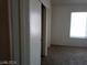 Bedroom with neutral colored walls, carpet, and a closet at 70 Belle Essence Ave, Las Vegas, NV 89123