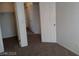 This bedroom features a closet and multiple doorways at 70 Belle Essence Ave, Las Vegas, NV 89123