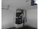 Spacious garage with an HVAC system and plenty of room for parking at 70 Belle Essence Ave, Las Vegas, NV 89123