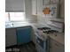 Bright kitchen featuring modern appliances, window, and ample counter space at 70 Belle Essence Ave, Las Vegas, NV 89123