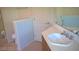 Bathroom with a cabinet with white countertop and a sink at 7290 Sheared Cliff Ln # 102, Las Vegas, NV 89149