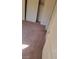 Bedroom with neutral walls and carpeting, also features a closet with double doors at 7290 Sheared Cliff Ln # 102, Las Vegas, NV 89149